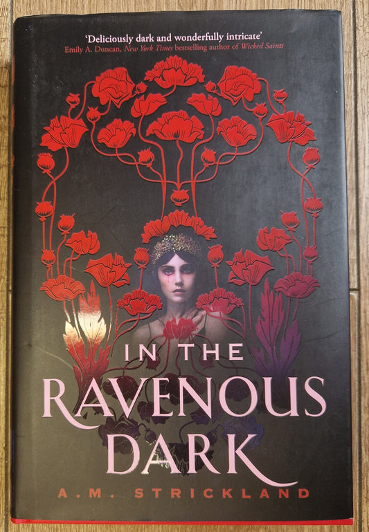 In The Ravenous Dark by A.M. Strickland (First Edition)